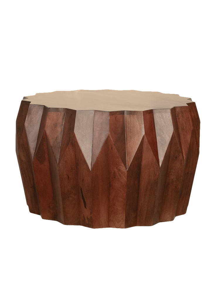 A round, solid wood coffee table with a geometric faceted shape, predominantly brown in color.