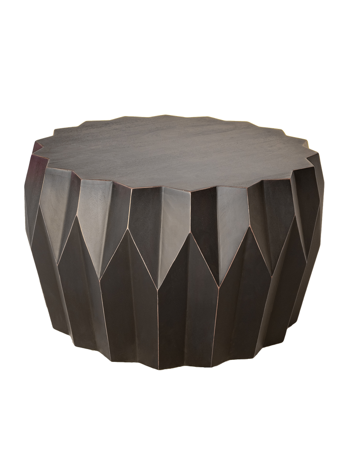 A round, solid wood coffee table with a geometric faceted shape, predominantly brown in color.